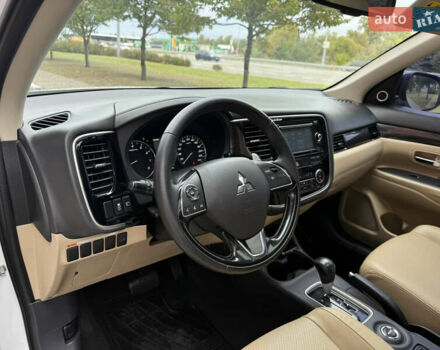 Белый Мицубиси Аутлендер, объемом двигателя 2.4 л и пробегом 160 тыс. км за 16600 $, фото 30 на Automoto.ua