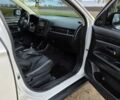 Белый Мицубиси Аутлендер, объемом двигателя 2.36 л и пробегом 169 тыс. км за 13300 $, фото 14 на Automoto.ua