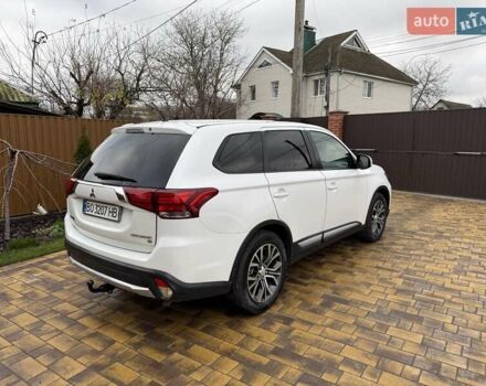 Белый Мицубиси Аутлендер, объемом двигателя 2.36 л и пробегом 191 тыс. км за 13950 $, фото 12 на Automoto.ua