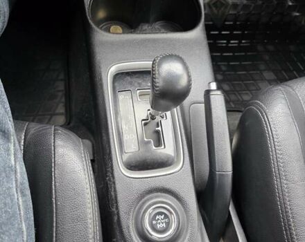 Белый Мицубиси Аутлендер, объемом двигателя 2.36 л и пробегом 169 тыс. км за 13300 $, фото 17 на Automoto.ua