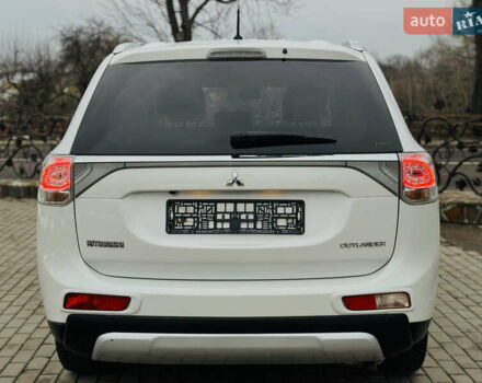 Белый Мицубиси Аутлендер, объемом двигателя 2.2 л и пробегом 140 тыс. км за 16200 $, фото 26 на Automoto.ua