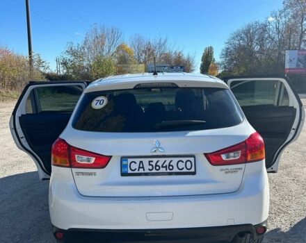 Белый Мицубиси Аутлендер, объемом двигателя 2 л и пробегом 255 тыс. км за 11500 $, фото 9 на Automoto.ua