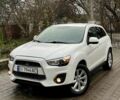 Белый Мицубиси Аутлендер, объемом двигателя 2 л и пробегом 168 тыс. км за 10800 $, фото 1 на Automoto.ua