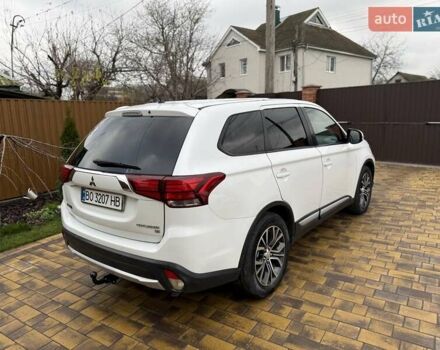 Белый Мицубиси Аутлендер, объемом двигателя 2.36 л и пробегом 191 тыс. км за 13950 $, фото 11 на Automoto.ua