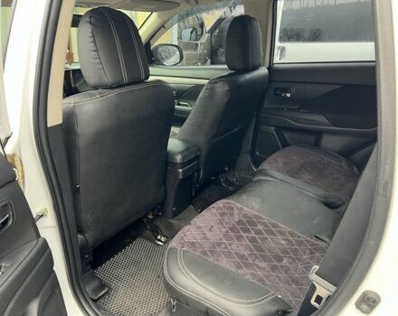 Белый Мицубиси Аутлендер, объемом двигателя 3 л и пробегом 175 тыс. км за 13100 $, фото 7 на Automoto.ua