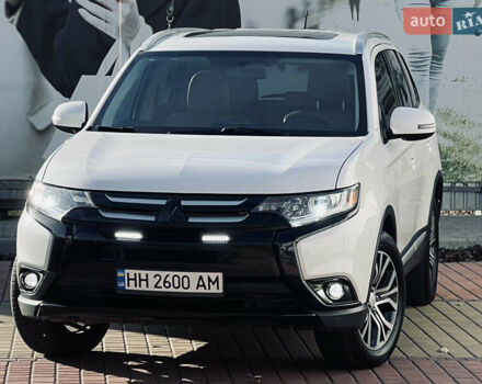 Белый Мицубиси Аутлендер, объемом двигателя 2.4 л и пробегом 147 тыс. км за 12999 $, фото 3 на Automoto.ua