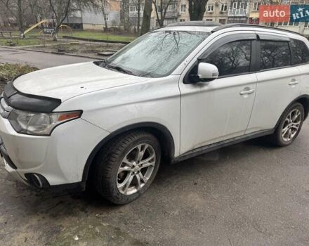 Белый Мицубиси Аутлендер, объемом двигателя 2.4 л и пробегом 144 тыс. км за 12500 $, фото 2 на Automoto.ua