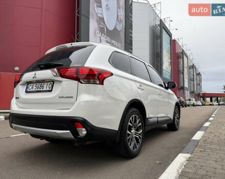 Мицубиси Аутлендер 2015 в Киеве на Automoto.ua Белый Мицубиси Аутлендер, объемом двигателя 2.4 л и пробегом 159 тыс. км за 17300 $, фото 4 на Automoto.ua