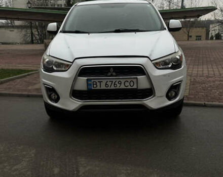 Белый Мицубиси Аутлендер, объемом двигателя 2 л и пробегом 161 тыс. км за 9200 $, фото 1 на Automoto.ua