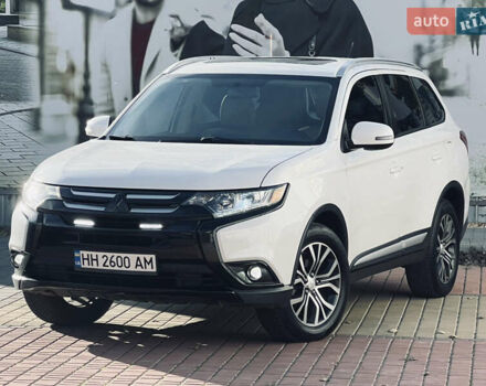 Белый Мицубиси Аутлендер, объемом двигателя 2.4 л и пробегом 147 тыс. км за 12999 $, фото 1 на Automoto.ua