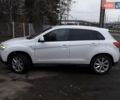 Білий Міцубісі Аутлендер, об'ємом двигуна 2 л та пробігом 89 тис. км за 14000 $, фото 4 на Automoto.ua