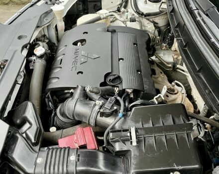 Белый Мицубиси Аутлендер, объемом двигателя 2 л и пробегом 168 тыс. км за 10800 $, фото 22 на Automoto.ua