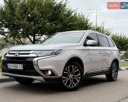 Белый Мицубиси Аутлендер, объемом двигателя 2.4 л и пробегом 160 тыс. км за 16900 $, фото 6 на Automoto.ua