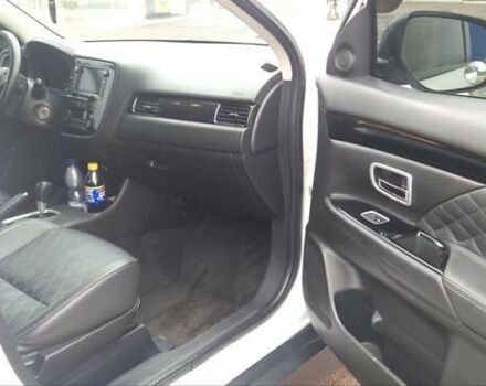 Белый Мицубиси Аутлендер, объемом двигателя 2.4 л и пробегом 240 тыс. км за 14900 $, фото 12 на Automoto.ua