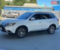 Белый Мицубиси Аутлендер, объемом двигателя 2.36 л и пробегом 185 тыс. км за 14200 $, фото 7 на Automoto.ua