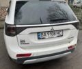 Белый Мицубиси Аутлендер, объемом двигателя 2.4 л и пробегом 144 тыс. км за 12500 $, фото 1 на Automoto.ua