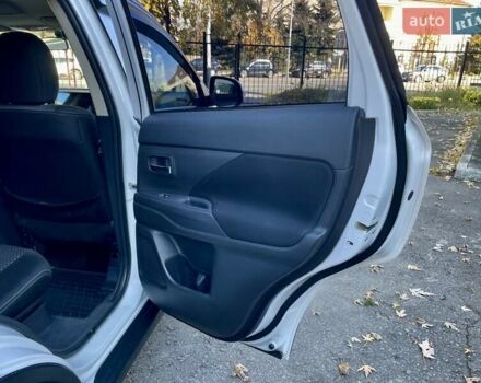 Белый Мицубиси Аутлендер, объемом двигателя 2 л и пробегом 146 тыс. км за 14500 $, фото 27 на Automoto.ua