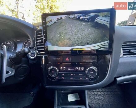 Белый Мицубиси Аутлендер, объемом двигателя 2 л и пробегом 146 тыс. км за 14500 $, фото 24 на Automoto.ua