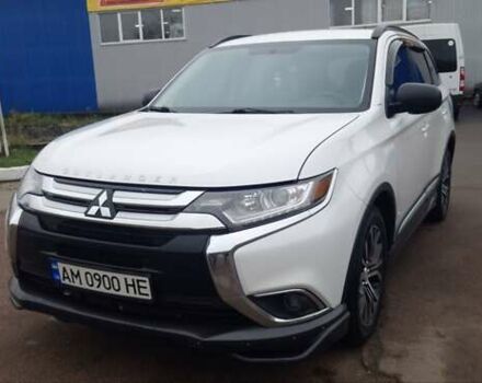 Белый Мицубиси Аутлендер, объемом двигателя 2.4 л и пробегом 240 тыс. км за 14900 $, фото 1 на Automoto.ua