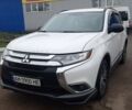 Белый Мицубиси Аутлендер, объемом двигателя 2.4 л и пробегом 240 тыс. км за 14900 $, фото 1 на Automoto.ua