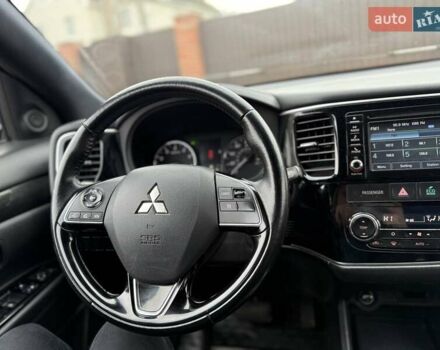 Белый Мицубиси Аутлендер, объемом двигателя 2.36 л и пробегом 191 тыс. км за 13950 $, фото 20 на Automoto.ua
