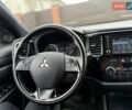 Белый Мицубиси Аутлендер, объемом двигателя 2.36 л и пробегом 191 тыс. км за 13950 $, фото 20 на Automoto.ua
