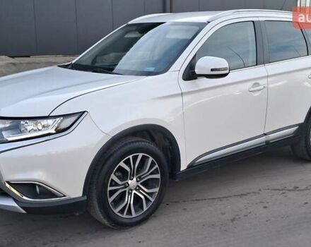 Білий Міцубісі Аутлендер, об'ємом двигуна 2.3 л та пробігом 130 тис. км за 14999 $, фото 1 на Automoto.ua