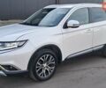 Білий Міцубісі Аутлендер, об'ємом двигуна 2.3 л та пробігом 130 тис. км за 14999 $, фото 1 на Automoto.ua
