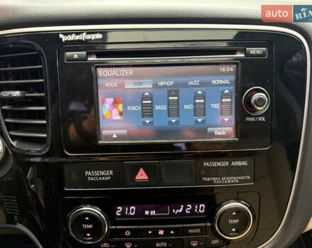 Белый Мицубиси Аутлендер, объемом двигателя 2.4 л и пробегом 160 тыс. км за 16500 $, фото 40 на Automoto.ua