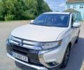 Белый Мицубиси Аутлендер, объемом двигателя 2.36 л и пробегом 142 тыс. км за 14200 $, фото 1 на Automoto.ua