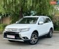 Белый Мицубиси Аутлендер, объемом двигателя 2.4 л и пробегом 141 тыс. км за 13999 $, фото 1 на Automoto.ua