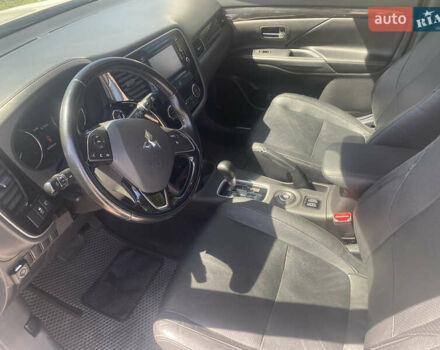 Білий Міцубісі Аутлендер, об'ємом двигуна 2.36 л та пробігом 159 тис. км за 15500 $, фото 10 на Automoto.ua