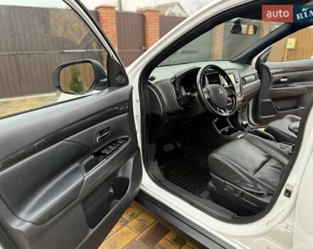 Белый Мицубиси Аутлендер, объемом двигателя 2.36 л и пробегом 191 тыс. км за 13950 $, фото 30 на Automoto.ua