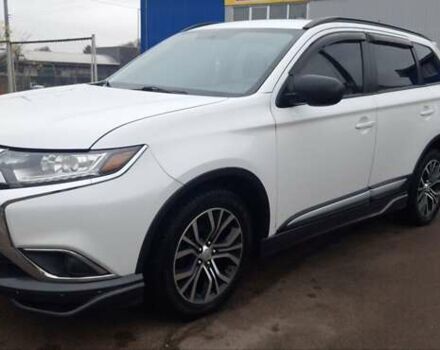 Белый Мицубиси Аутлендер, объемом двигателя 2.4 л и пробегом 240 тыс. км за 14900 $, фото 3 на Automoto.ua