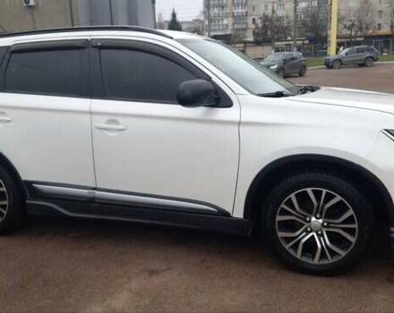 Белый Мицубиси Аутлендер, объемом двигателя 2.4 л и пробегом 240 тыс. км за 14900 $, фото 6 на Automoto.ua