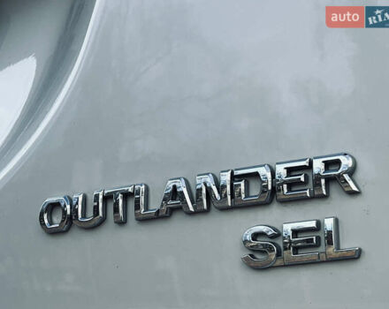 Белый Мицубиси Аутлендер, объемом двигателя 2.4 л и пробегом 147 тыс. км за 12999 $, фото 29 на Automoto.ua