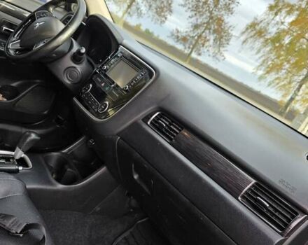 Белый Мицубиси Аутлендер, объемом двигателя 2.36 л и пробегом 169 тыс. км за 13300 $, фото 13 на Automoto.ua