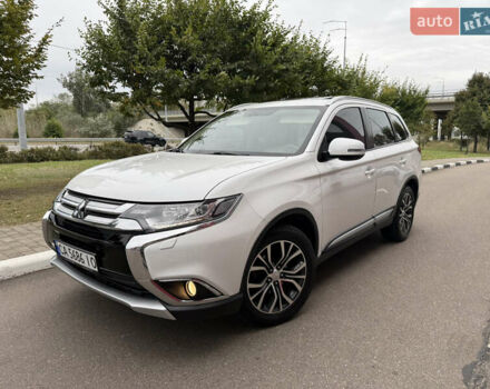 Белый Мицубиси Аутлендер, объемом двигателя 2.4 л и пробегом 159 тыс. км за 16700 $, фото 4 на Automoto.ua