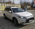 Белый Мицубиси Аутлендер, объемом двигателя 2.36 л и пробегом 152 тыс. км за 15199 $, фото 3 на Automoto.ua