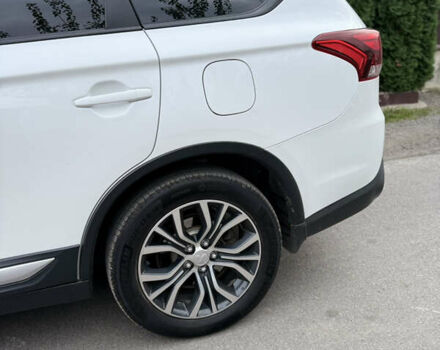 Белый Мицубиси Аутлендер, объемом двигателя 2.36 л и пробегом 134 тыс. км за 18500 $, фото 31 на Automoto.ua