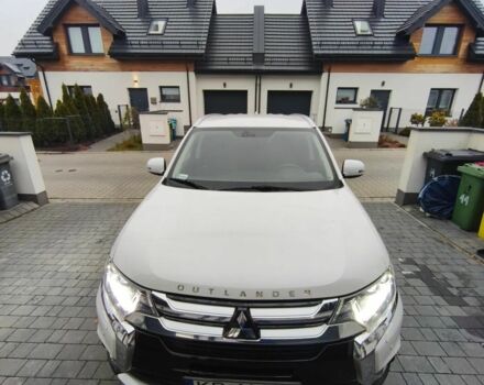 Белый Мицубиси Аутлендер, объемом двигателя 2 л и пробегом 135 тыс. км за 10200 $, фото 7 на Automoto.ua