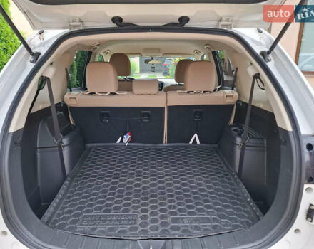 Белый Мицубиси Аутлендер, объемом двигателя 2.4 л и пробегом 145 тыс. км за 14900 $, фото 9 на Automoto.ua