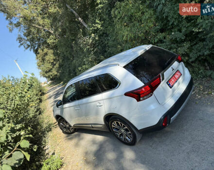Белый Мицубиси Аутлендер, объемом двигателя 2.2 л и пробегом 240 тыс. км за 17999 $, фото 50 на Automoto.ua