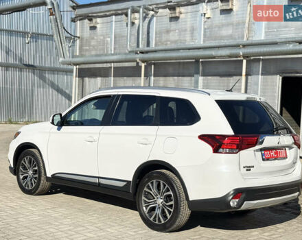 Білий Міцубісі Аутлендер, об'ємом двигуна 2.4 л та пробігом 178 тис. км за 12750 $, фото 6 на Automoto.ua