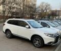 Білий Міцубісі Аутлендер, об'ємом двигуна 2.4 л та пробігом 105 тис. км за 15800 $, фото 1 на Automoto.ua