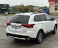 Белый Мицубиси Аутлендер, объемом двигателя 2.36 л и пробегом 225 тыс. км за 14650 $, фото 7 на Automoto.ua
