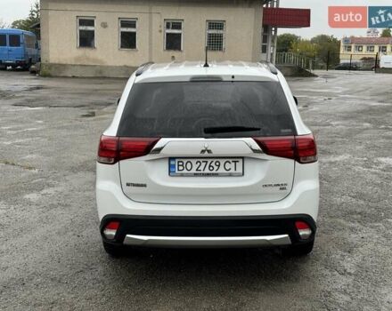 Белый Мицубиси Аутлендер, объемом двигателя 2.36 л и пробегом 225 тыс. км за 14650 $, фото 8 на Automoto.ua