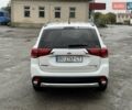 Белый Мицубиси Аутлендер, объемом двигателя 2.36 л и пробегом 225 тыс. км за 14650 $, фото 8 на Automoto.ua