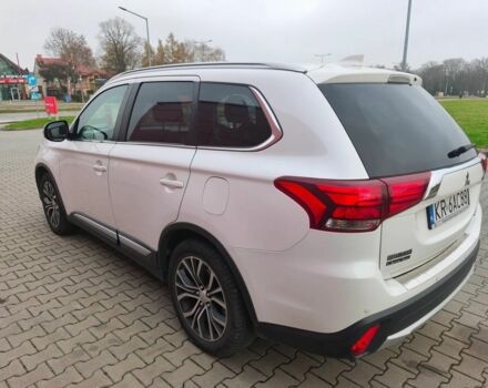 Белый Мицубиси Аутлендер, объемом двигателя 2 л и пробегом 135 тыс. км за 10200 $, фото 3 на Automoto.ua