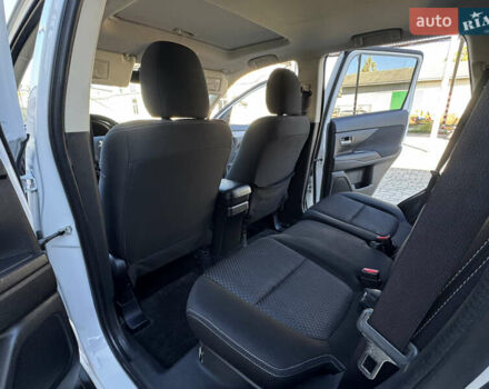 Білий Міцубісі Аутлендер, об'ємом двигуна 2.4 л та пробігом 178 тис. км за 12750 $, фото 54 на Automoto.ua